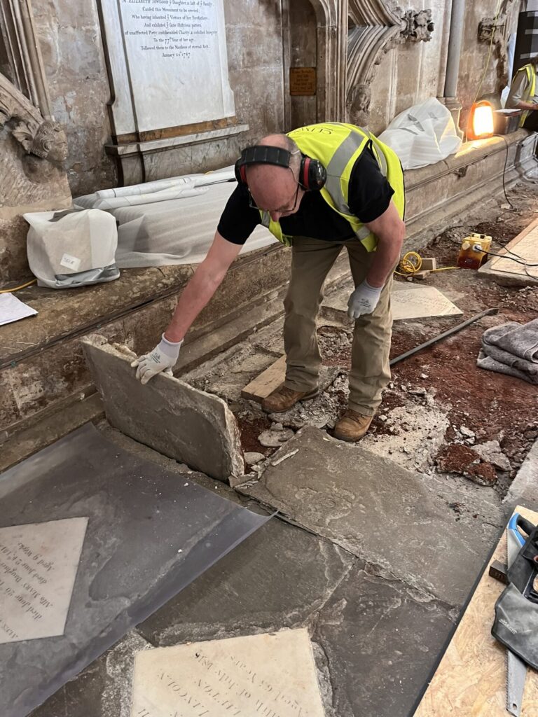 Lifting the floor and marble memorial slabs[69]